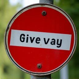 Give way road sign
